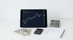 us stock market trading analysis tablet and cash